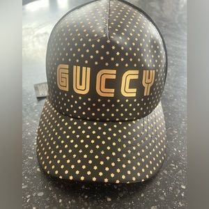 Gucci “Guccy” hat